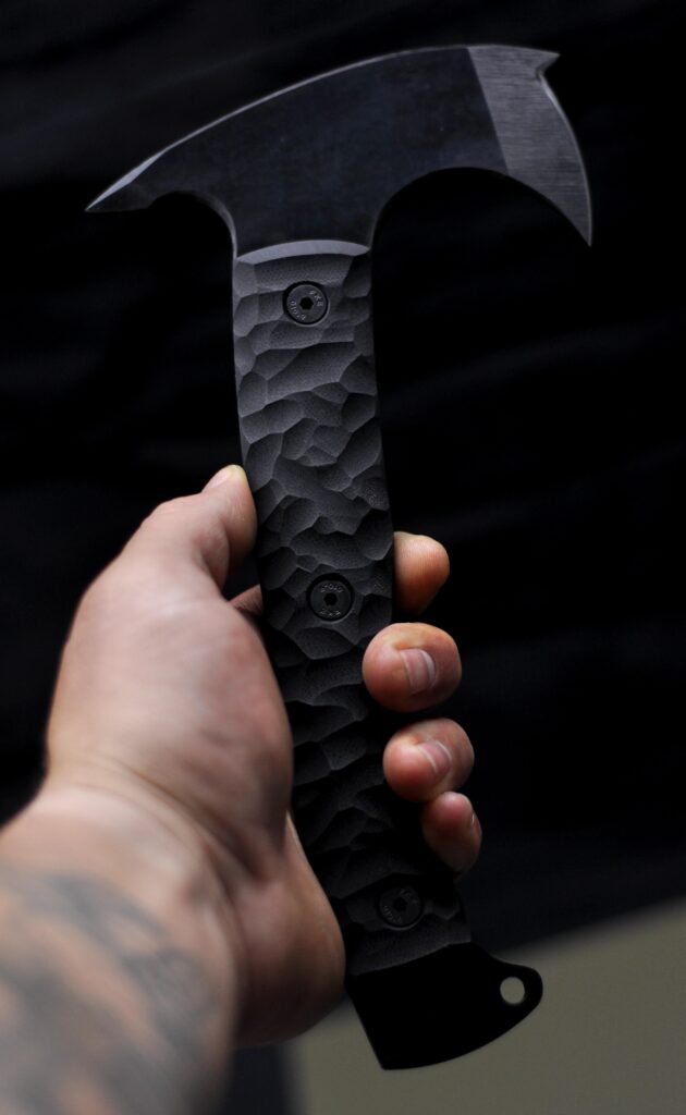 Not a knife, but one of my tomahawks - the Mullet, with some inspiration by Winkler's Sayoc. 80CrV2 with G10
