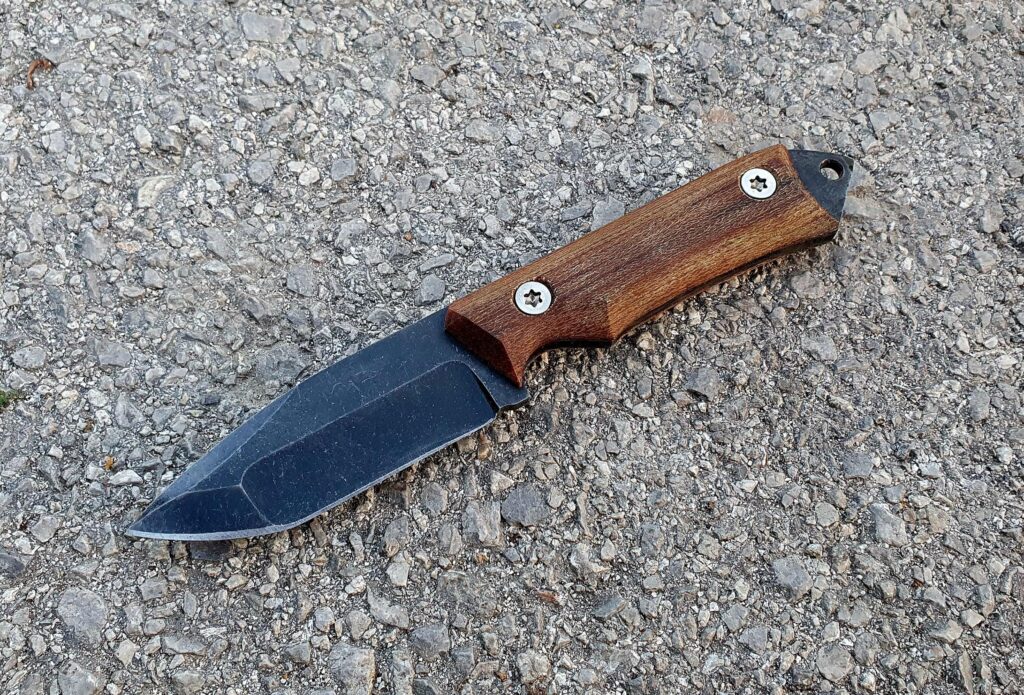Another Carcharodon leaves the workshop. 1095 with compound grind, stonewash and micarta. Whaddaya think?