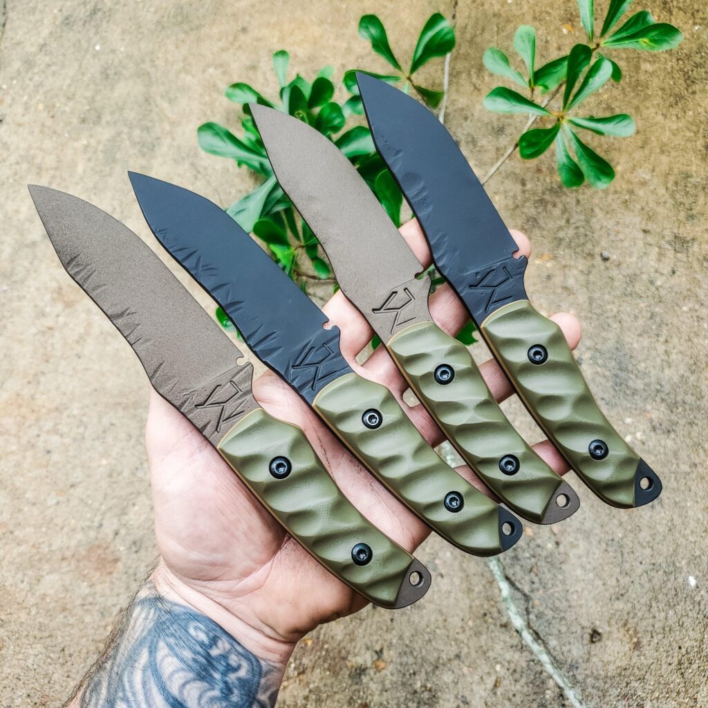 80crv2 Cerakoted Armor black and midnight bronze G10 handles.