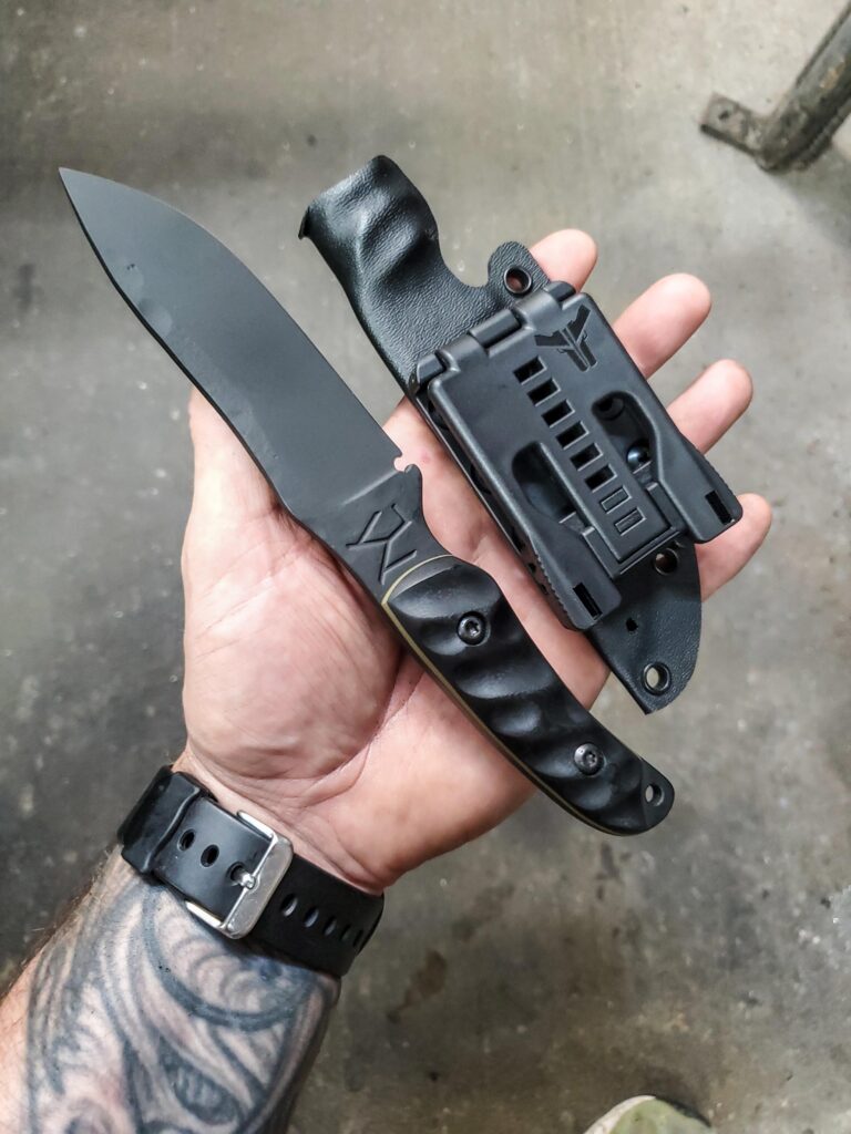 80crv2 with Armor black Cerakote and black G10 and OD green G10 liners.