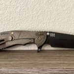 Real Hinderer XM-24, fake BPU. I got tired of searching for the BPU that I wanted, so I sent this to a modder for a BPU-style conversion. SUPER happy with the results, and the knife + mods was less than half the cost of a real BPU. All that's left is to acid etch the blade