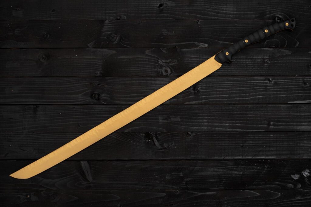 My version of fulltang wakizashi. 6150 Spring steel, Golden cerakote coating and black G10