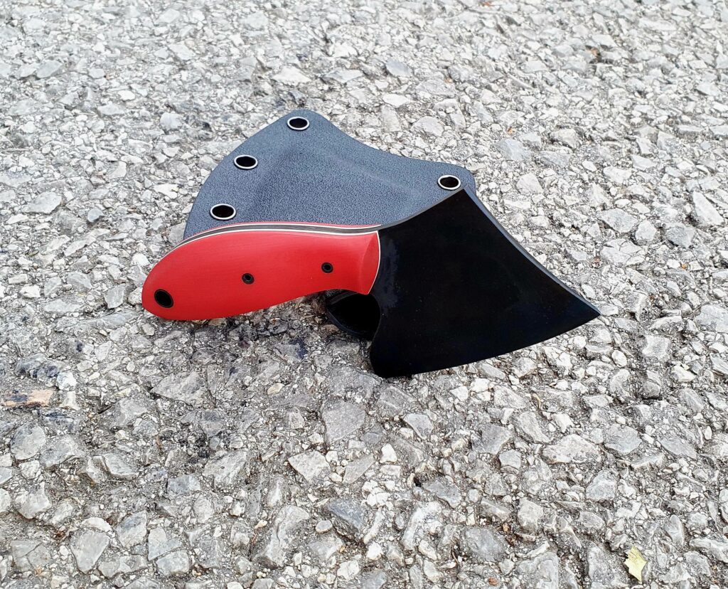 Aaand the Hatchlet is ready! 1095, G10 scales and kydex sheath.