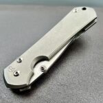 NKD large Sebenza glass blasted, silver hardware