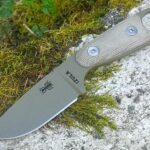 Esee Izula, got a grip for it and got it resharpen, feels like a brand new knife