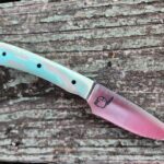 Neck knife with tiffany blue swirl scales