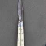 Inherited butterfly knife from deceased grandfather(more in comments)