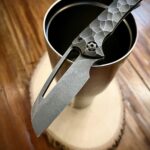 Gavko makes a fine knife. Nurse pictured.