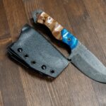 The Wanderer. Stonewashed 80crv2 with maple and composite scales, mosaic pins, and g10 liners.