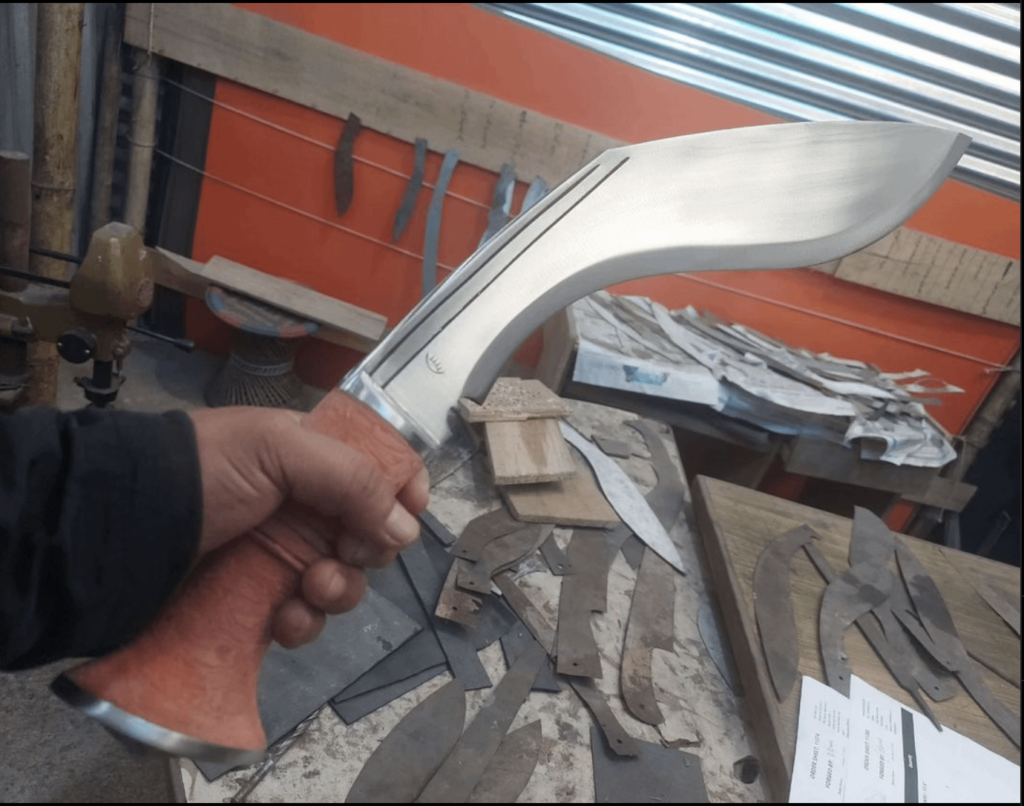 That's a pretty big knife ! it is called 17inches 1chirra with orange micarta handle which has satin finishing. isn't is amazing ?
