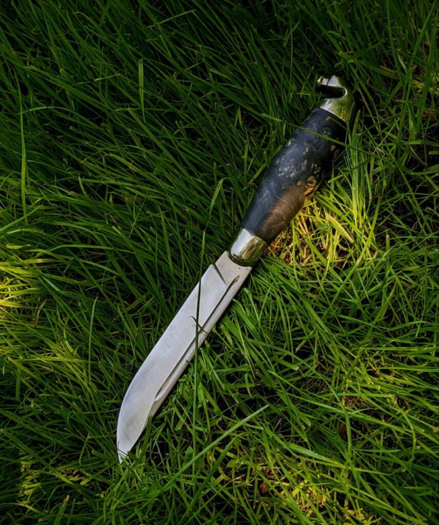 Puukko I made yesterday for a customer. I am very happy with it. What do you think of it? Should I consider making more of them??