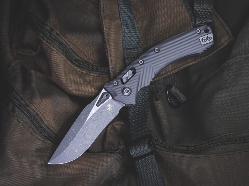 Microtech Amphibian in Natural Clear aluminum.
