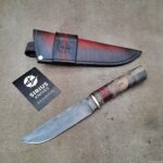 Had this blade a few years, before I came with the idea how to finish it. Damascus steel, brass, g10, stabilised maple and birch burrs