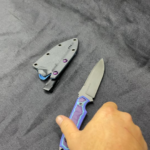 A friend wanted a knife made inspired by the Benchmade Nimravus, but with my twist on it, so there it is. Z-Wear and some G10 I mashed up together