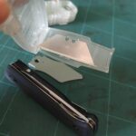 I can't figure out how to remove the spare utility blades ( roxon )