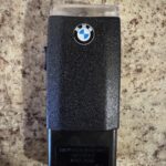 My 20 y/o car has a rechargeable incandescent flashlight that plugs into the glove box. Beamshot included