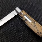 handmade custom slipjoint in spalted tamarind 14c28n stainless (Samsung A23 cell phone pic)