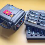 I cut foam to fit two layers of flashlights in a Pelican 1300 case