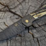 Cowboy hunter with ADS damascus. Elk antler for the scales. Cool little project patterned after my folder