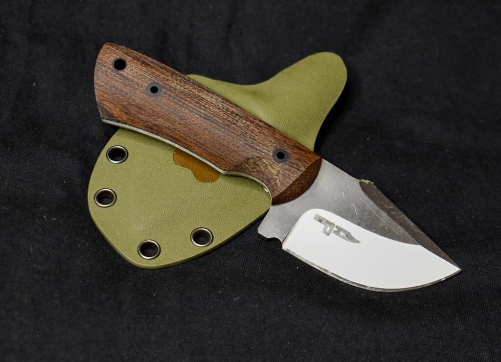 Tiny companion is finally done. 14C28N with cryo with semi stonewash, classic micarta, G10 and engraved bear paw. I reckon it would suit to call it Bear Claw. What do you think?