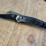 Benchmade 943 in Metonboss dark Titanium scales, and his older brother the 943 in flytanium scales