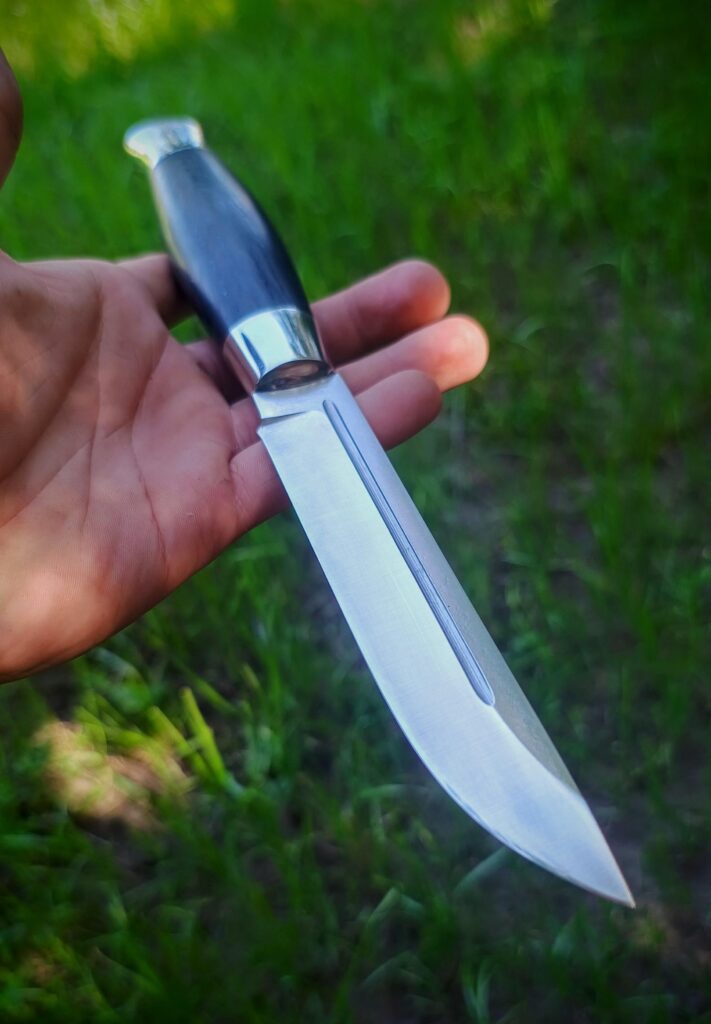 Just finished this beautiful M390, 61 hrc puukko knife! Took me longer than usual because of power shortages. I really like it. What do you think of it?