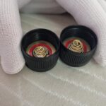 Got a new hanklight and is the back cap suppose to be depressed like that? One on the left is the new one and the one on the right is how its suppose to be. It makes good contact though.