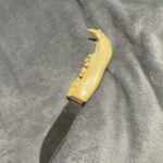 Grandpas hunting knife with a bear jaw as for the handle.