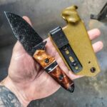 80crv2 stonewashed with Karelian Birch and old growth Red wood and an carbon fiber split.