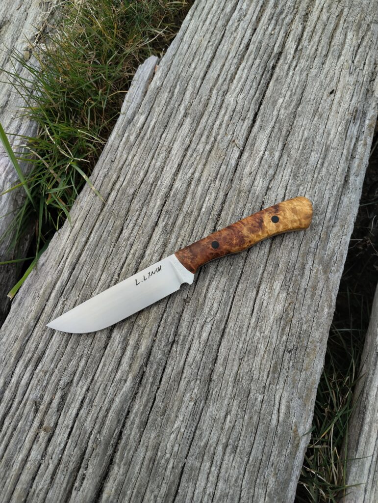 Two tone amboyna burl really adds another dimension to a handle