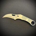 Just finished making this Titanium and MagnaCut Karambit Style Crossbar Folder.  Always a real challenge but definitely an enjoyable effort.