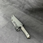 A stealthy EDC bowie just finished. Z-Wear @ 63HRC, carbon and some blue liners