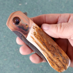 Mammoth ivory with a Damasteel blade and back spacer. Jeweled Ti liners for coolness. Gold plated screws and a Timascus pivot make this smooth as glass.