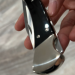 Buck 110 in Magnacut with waterbuffalo scales and nickel bolsters