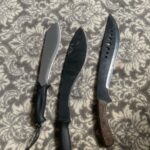 kukri appreciation thread? owned the cold steel since i was a kid and it still takes down small trees better than machetes i’ve owned . the one on the right is from tractor supply and has also seen much use.  picked up this gerber last winter and haven’t gotten a chance to really use it.