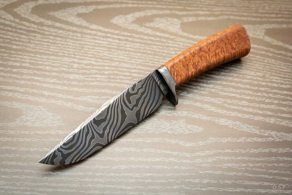 Hunter out of low layer twisted damascus. 80crv2 and 15n20,