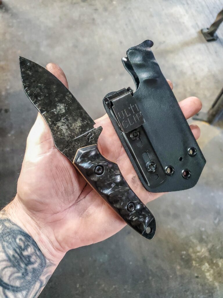 80crv2 EDC granite finish and carbon fiber with coyote brown G10 liners.