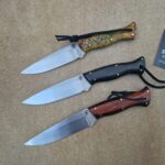 My three Bushcraft Knives together, Stabilised Burr, Bog Oak Dated 7000 years and Ironwood.