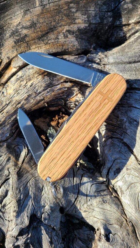 Custom made red oak scales on the Victorinox Climber.