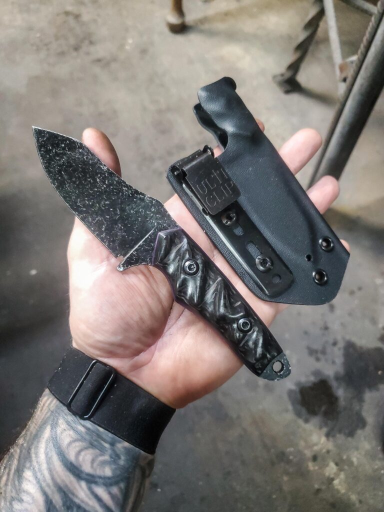80crv2 EDC Stone washed with Carbon fiber and Royal purple G10 liners.