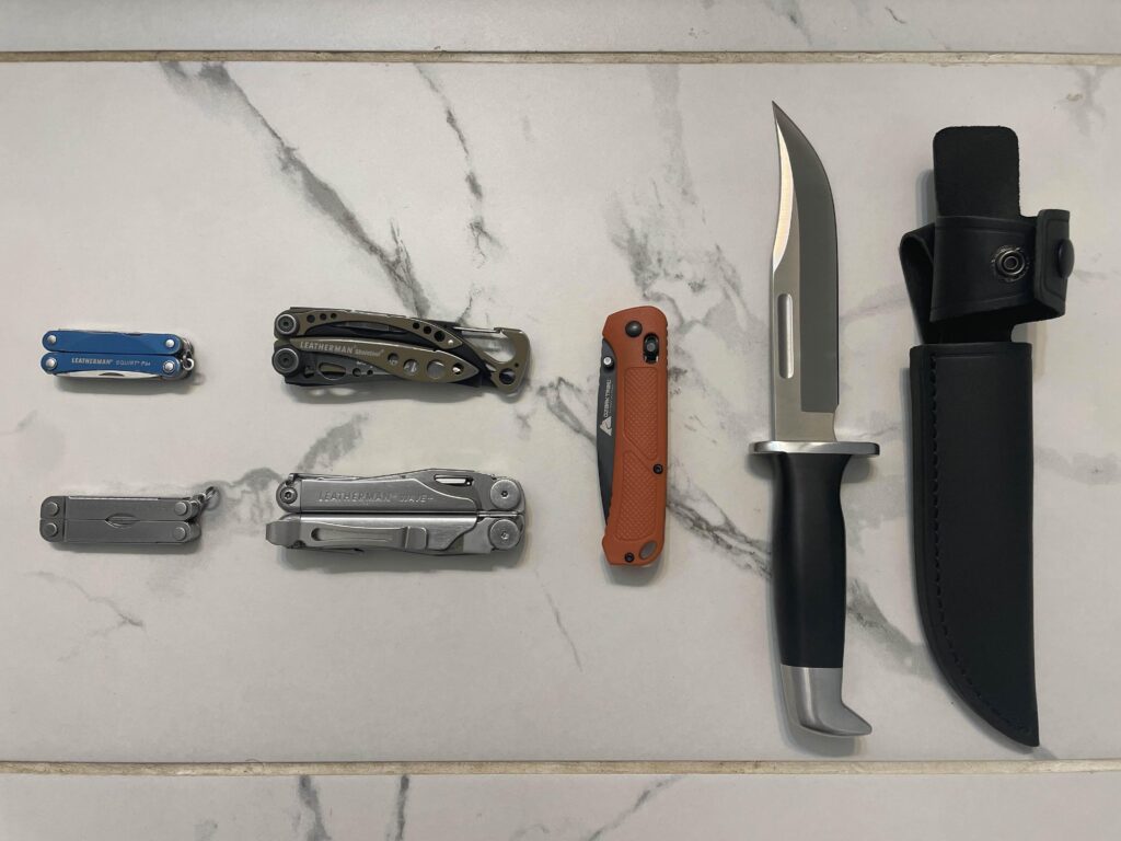 A collection of budget knives and used Leathermans I got for great prices
