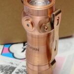 Happy to report, the Button on the SC13 Copper is fine. while it is 'lose' it works perfectly fine (no binding up or grittyness) and the looseness is actually kinda fidgeting fun.