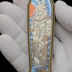 Hand-engraved folding knife details