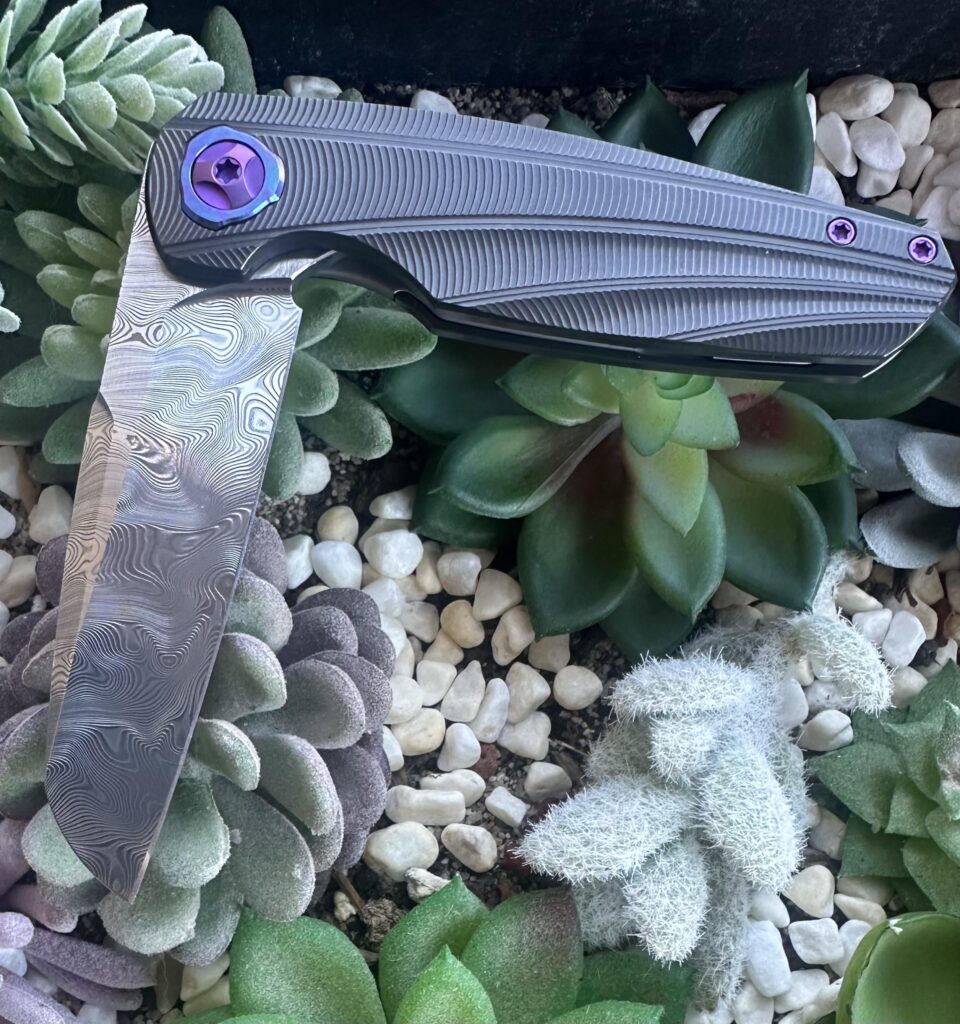 NKD. Full dress zirc haptic with bjorkman’s twist dama and timascus.