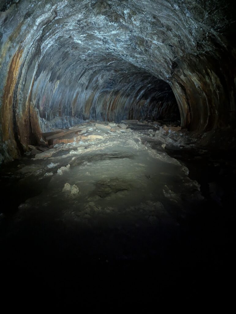 My Sofirn SC28 lighting the way through the lava river caves outside of Flagstaff, AZ