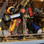 Flashlight bin at a junk store