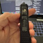 Microtech proprietary screws