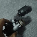 I'm so stupid. Could anyone tell me how to open the battery compartment of the Surefire M111D?