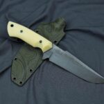 Stonewashed ELMAX with cryo at 61HRC, ivory micarta, G10 pins, tube and liners, kydex sheath. What do you think?