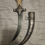 Silver sheath and handle made with Damascus and elephant tusk